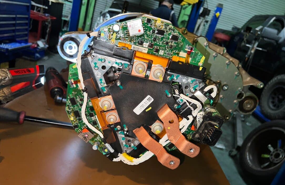 A Tesla drive unit inverter board during repair